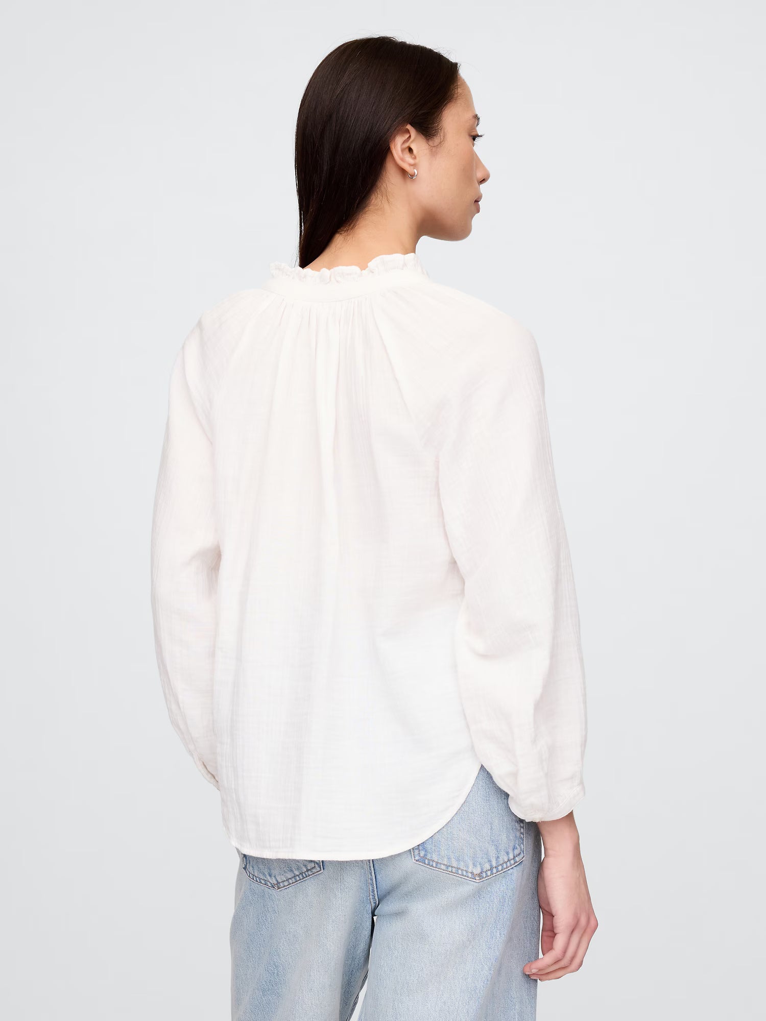 White ruffled collar shirt